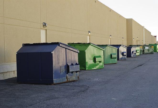 metal waste containers sit at a busy construction site in Reseda CA